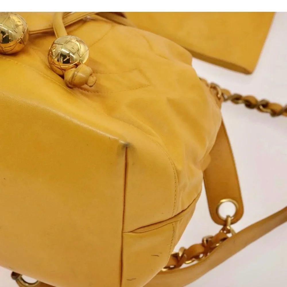 Authentic CHANEL yellow lambskin bucket bag with wallet pouch